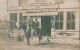 Boone Hiser and John Duff in front of Coggan and Son's Store